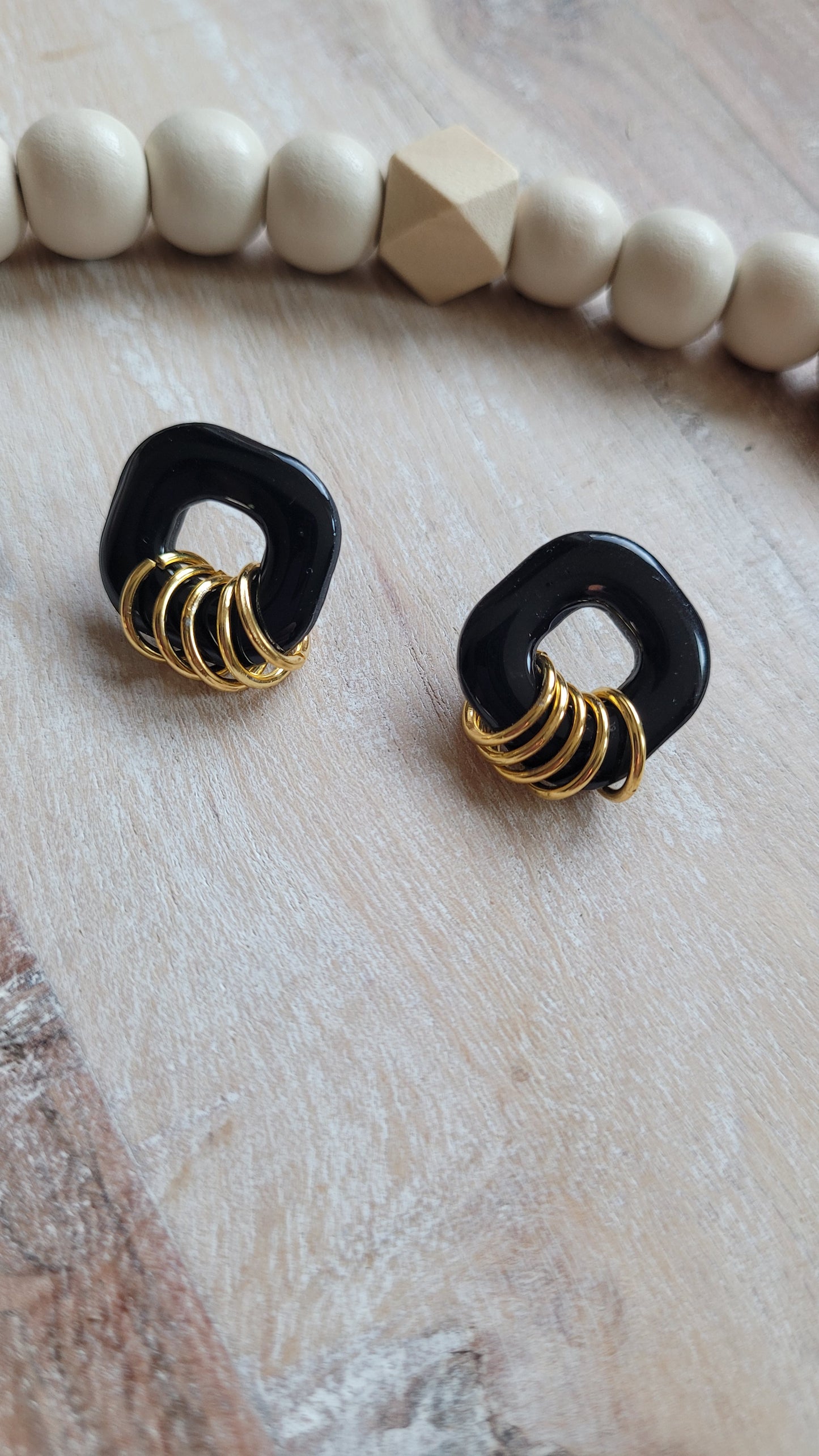 Becca (gold colored rings)