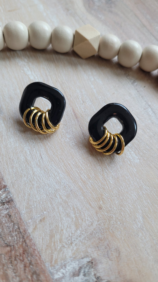 Becca (gold colored rings)