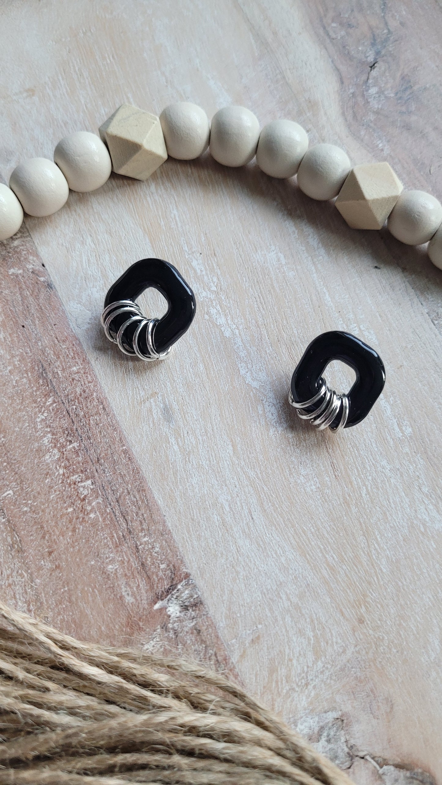 Becca (silver colored rings)