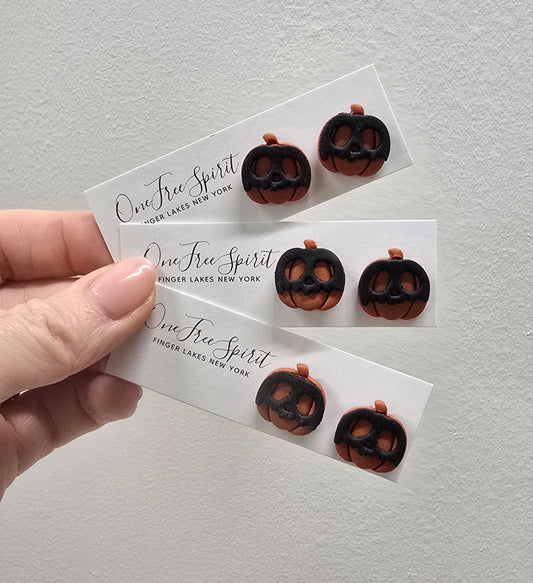Masked pumpkin studs