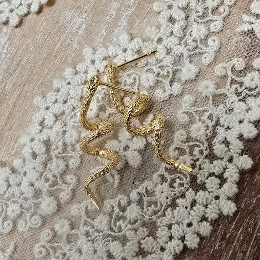 Statement snakes earrings